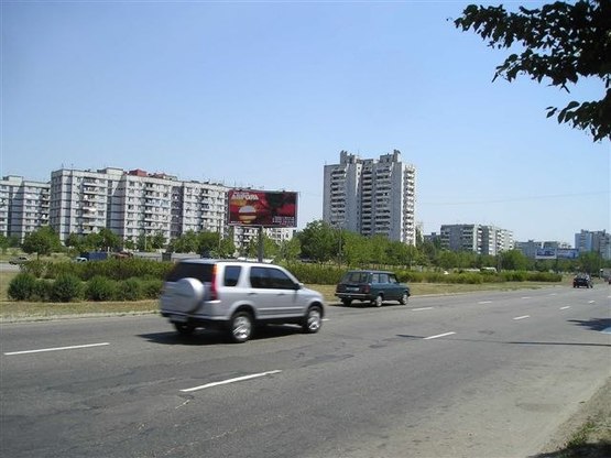 Фото рекламной плоскости по адресу Набережна магістраль - вул.Українська (коло) , напрямок руху до вокзалу