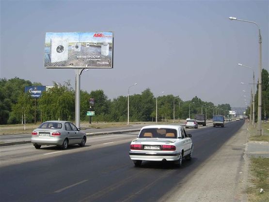 Фото рекламной плоскости по адресу Набережна магістраль - АЗС "ТНК" №24, ресторан "Орбіта", напрямок руху до порту