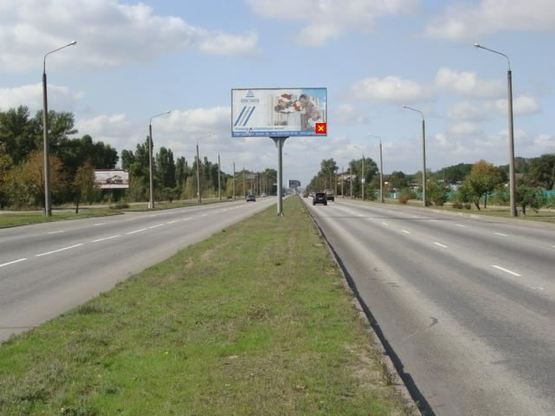 Фото рекламной плоскости по адресу Набережна магістраль - вул.Бульварна, АЗС, напрямок руху до порту