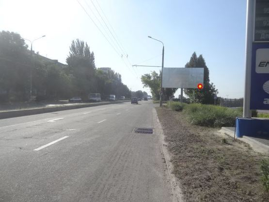 Фото рекламной плоскости по адресу вул.Перемоги - Вознесенівський ринок, АЗС "ТНК", ст.А