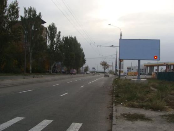Фото рекламной плоскости по адресу вул.Перемоги,93  - маг "Олімпія", АЗС, ст.А