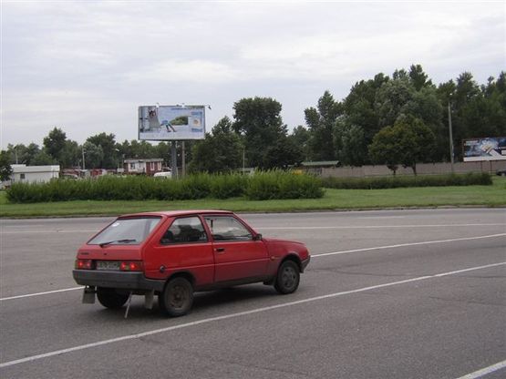 Фото рекламной плоскости по адресу Набережна магістраль - вул.Українська (коло), облияям на вул.Українську
