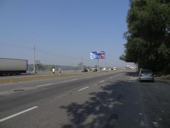 Фото рекламної площини за адресою Набережна магістраль - вул.Ніжнедніпровська, кафе "Сонечко", напрямок руху до порту