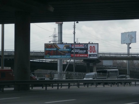 Фото рекламной плоскости по адресу Надднепрянское шоссе ( Южный мост , по ходу к мосту Патона)