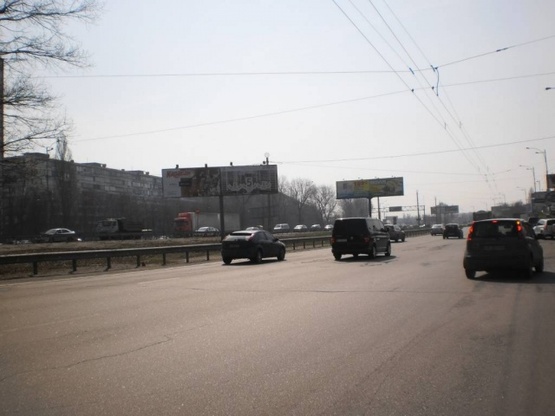 Фото рекламної площини за адресою Окружная дорога, разделитель / напротив пов-та на Жмеринскую ул. по ходу к Жулянскому путепроводу