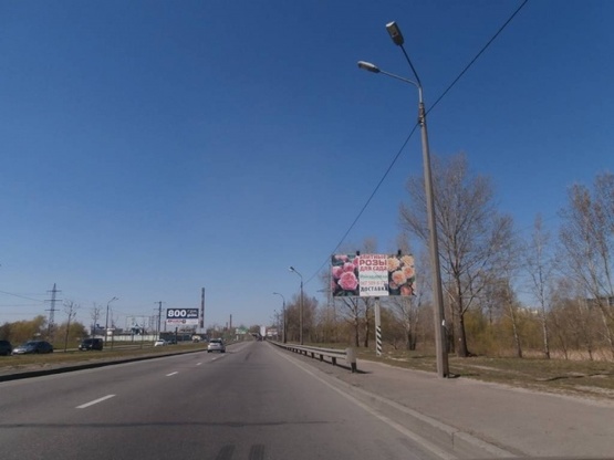 Фото рекламної площини за адресою Богатырская ул., за 400м  по ходу от Петровки к мосту по ул.Добрынинская