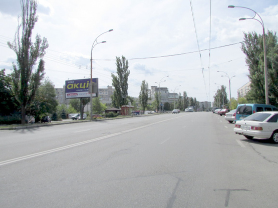 Фото рекламной плоскости по адресу Маршала Малиновського, 34 рух від проспекту Героїв Сталінграда, ліворуч