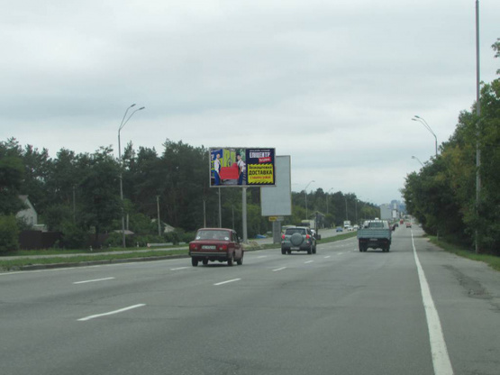 Фото рекламной плоскости по адресу Броварський проспект (розподілювач), "Биківня", рух в напрямку Киева