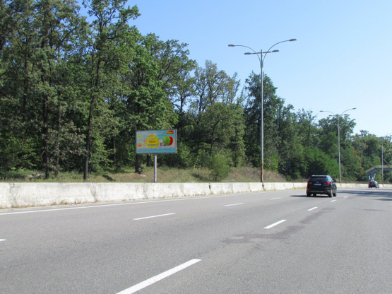 Фото рекламной плоскости по адресу Велика Кільцева дорога, за 100 метрів руху до Лісозахисна вулиця  від Гостомельського шосе, ліворуч