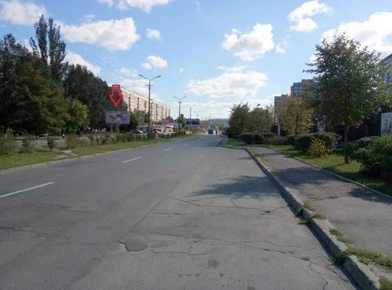 Фото рекламной плоскости по адресу вул. Комунарівська (Юрія Кондратюка), 8