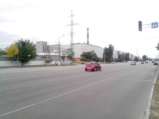 Фото рекламной плоскости по адресу Набережная Заводская, из центра, вблизи автомойка