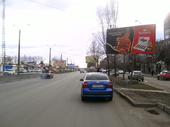 Фото рекламной плоскости по адресу Днепропетровская дорога №76 А