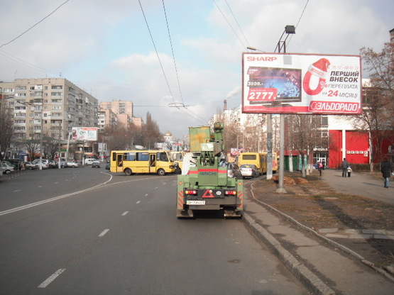 Фото рекламной плоскости по адресу Королева №65 А