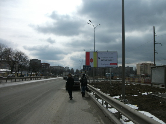 Фото рекламной плоскости по адресу 1-й км Новониколаевской дороги выезд Таврия-В А