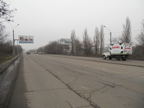 Фото рекламної площини за адресою Киевское шоссе напротив Новомосковской дороги №5 В