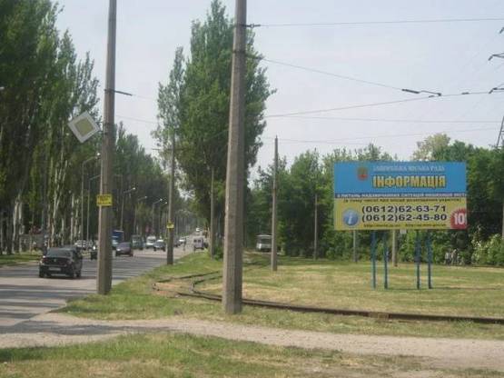 Фото рекламной плоскости по адресу 005_Запорожье_ул.Магистральная/тр. Москва-Симферополь. Въезд с Аэропорта