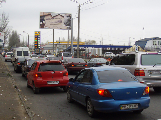 Фото рекламной плоскости по адресу Ат.Головатого - автосалон "Тотус"  (щит справа)