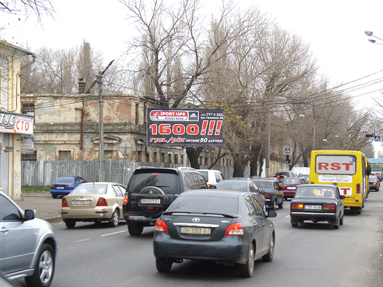 Фото рекламної площини за адресою Ат.Головатого - автосалон "Тотус" ( щит слева)