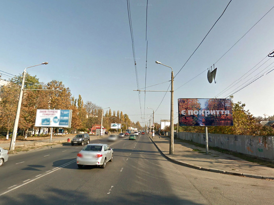 Фото рекламної площини за адресою Комарова - завод "Промсвязь"