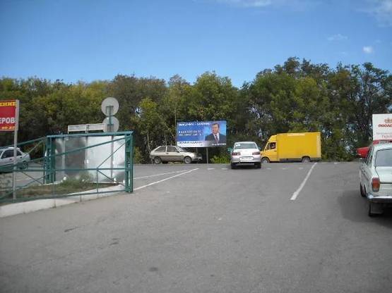 Фото рекламной плоскости по адресу 100_Запорожье_Авторынок -1  слева