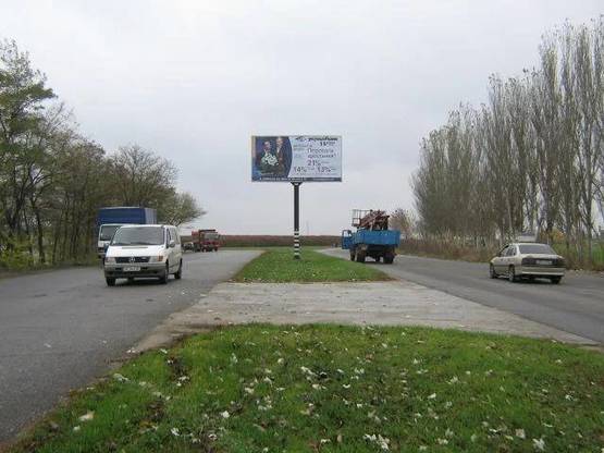 Фото рекламной плоскости по адресу 112_Запорожье_ул.Тиражная 150м от трассы -выезд из города