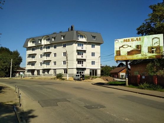 Фото рекламной плоскости по адресу вул. Петлюри (автосервіс "Спафіс"), виїзд