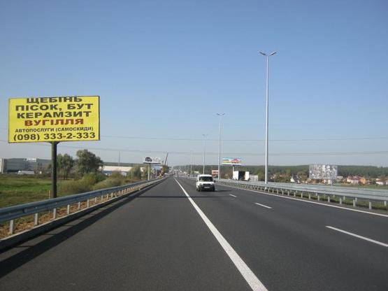 Фото рекламної площини за адресою Киев-Житомир 20+850 КПП, из Киева