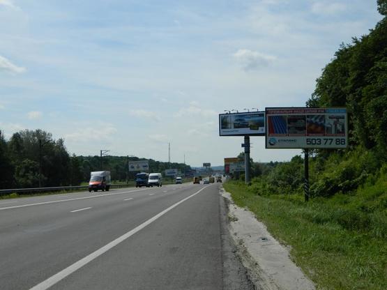 Фото рекламной плоскости по адресу Новообуховская трасса 20+200 справа из Киева