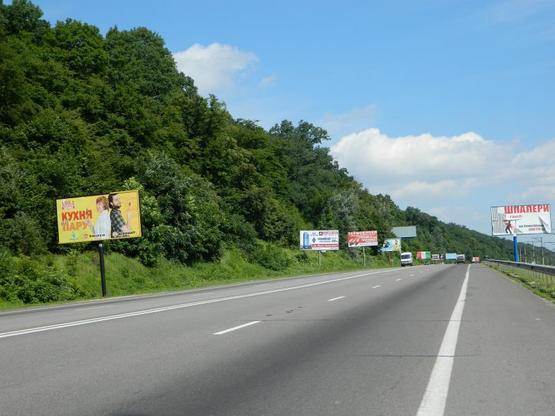 Фото рекламної площини за адресою Новообуховская трасса 20+200 справа в Киев
