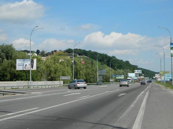 Фото рекламной плоскости по адресу Новообуховская трасса 20+780 справа в Киев