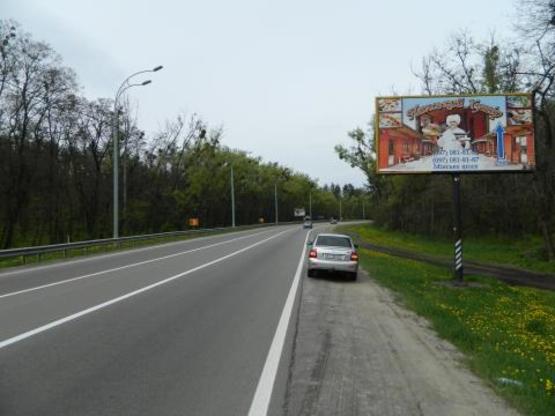 Фото рекламной плоскости по адресу Киев-Иванков-Овруч 18+780 справа из Киева