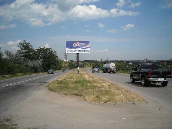 Фото рекламної площини за адресою 125_Запорожье_ул.Тиражная 80м от торгбазы-въезд в город