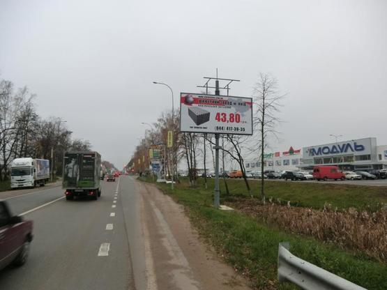 Фото рекламной плоскости по адресу Киев-Кoвель (Варшавка) 29+950 справа (Буча) ТЦ Мoдуль из Киева