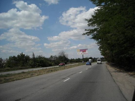 Фото рекламной плоскости по адресу 136_Запорожье_ул.Тиражная 180м от выезда в п.Солнечный-выезд из города