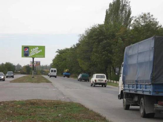 Фото рекламной плоскости по адресу 138_Заорожье_ул.Тиражная 60м от выезда в п.Солнечный-выезд из города