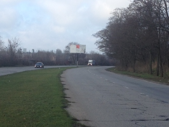 Фото рекламной плоскости по адресу 148_Запорожье_ул.Тиражная 50м от выезда в Осипенкосвкий микрорайон  -выезд из города