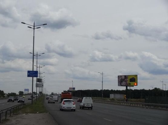 Фото рекламной плоскости по адресу Б. Окружная , Жулянский мост в сторону Одесской пл.