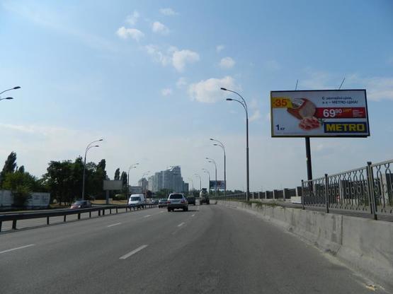 Фото рекламной плоскости по адресу Набережнo-Рыбальская ул. , 75 м от ж/д моста к пр. Московский