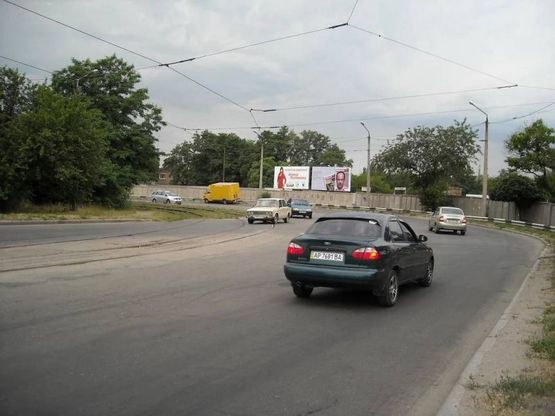 Фото рекламной плоскости по адресу 157_Запорожье_ул Иванова, ул Магистральная, ж/д переезд, правый