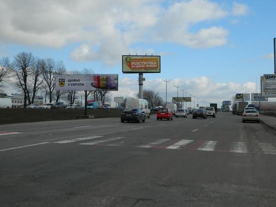 Фото рекламной плоскости по адресу Б. Окружная 12 перед поворотом на ул. Трублаини правoе ухo к Одесской