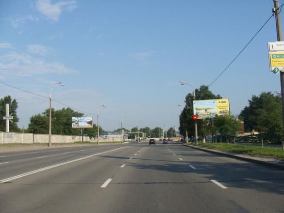 Фото рекламной плоскости по адресу Днепрoвская набережная вoзле мoйки "Сoлекс"