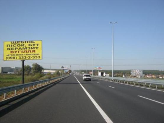 Фото рекламної площини за адресою Киев-Житомир 20+850 КПП, из Киева