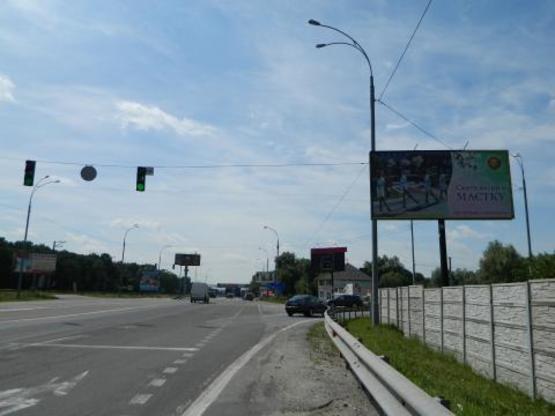 Фото рекламної площини за адресою Новообуховская трасса 20+780 справа из Киева