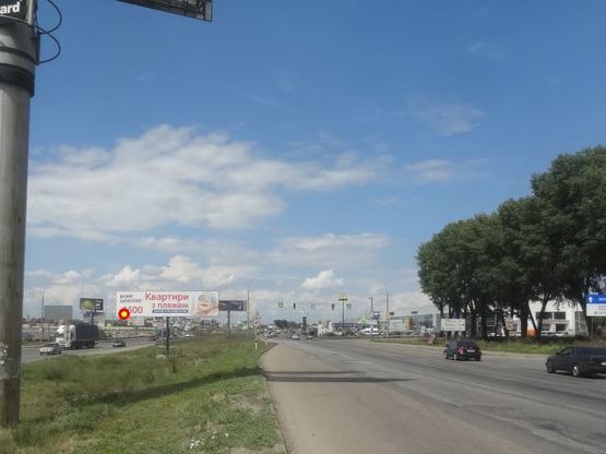 Фото рекламной плоскости по адресу Б. Окружная 12 перед поворотом на ул. Трублаини левое ухo к Победы