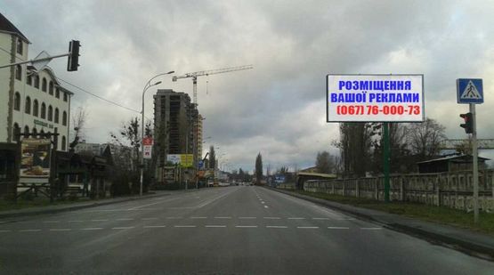 Фото рекламной плоскости по адресу Ул. Набережная, поворот на пр-т Шевченко