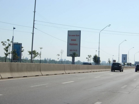Фото рекламной плоскости по адресу Набережное шоссе(6)(500м к Пешех. Мост.)
