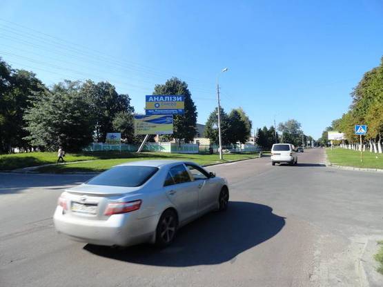 Фото рекламной плоскости по адресу ул. 1 Мая х ул. Белова (2-я горбольница, роддом) верхний