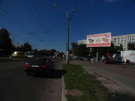 Фото рекламної площини за адресою 1 Мая, 2-я горбольница, маркет ЭКО (сторона А)