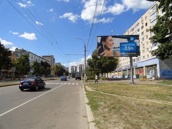 Фото рекламної площини за адресою ул. Рокоссовского 12 (сторона А)