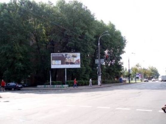 Фото рекламної площини за адресою Щербакова ул., 54 / Салютная ул. (напротив рынка "Нивки")